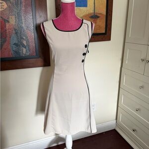 Elegant Cream Dress with Black Trim